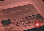 Image of Developing photographs in a dark room Pacific Theater, 1945, second 54 stock footage video 65675046450