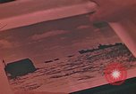 Image of Developing photographs in a dark room Pacific Theater, 1945, second 56 stock footage video 65675046450