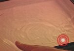 Image of Developing photographs in a dark room Pacific Theater, 1945, second 58 stock footage video 65675046450