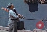 Image of Coast Guard Chief Petty Officer photographer Pacific Theater, 1945, second 5 stock footage video 65675046451
