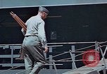 Image of Coast Guard Chief Petty Officer photographer Pacific Theater, 1945, second 13 stock footage video 65675046451