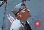 Image of Coast Guard Chief Petty Officer photographer Pacific Theater, 1945, second 37 stock footage video 65675046451