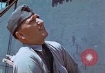 Image of Coast Guard Chief Petty Officer photographer Pacific Theater, 1945, second 38 stock footage video 65675046451