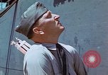 Image of Coast Guard Chief Petty Officer photographer Pacific Theater, 1945, second 39 stock footage video 65675046451