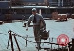 Image of Coast Guard Chief Petty Officer photographer Pacific Theater, 1945, second 46 stock footage video 65675046451
