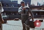 Image of Coast Guard Chief Petty Officer photographer Pacific Theater, 1945, second 49 stock footage video 65675046451