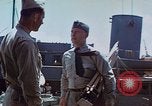 Image of Coast Guard Chief Petty Officer photographer Pacific Theater, 1945, second 52 stock footage video 65675046451