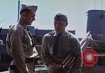 Image of Coast Guard Chief Petty Officer photographer Pacific Theater, 1945, second 53 stock footage video 65675046451