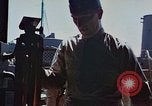 Image of Coast Guard Chief Petty Officer photographer Pacific Theater, 1945, second 55 stock footage video 65675046451