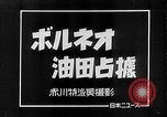 Image of Borneo Oil Fields Asia, 1942, second 11 stock footage video 65675046485
