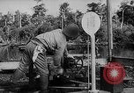 Image of Borneo Oil Fields Asia, 1942, second 35 stock footage video 65675046485