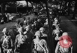Image of Japanese forces entering Bangkok Thailand, 1941, second 46 stock footage video 65675046489