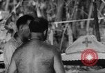 Immagine di La confessione e la massa Isola di Bougainville Papua Nuova Guinea, 1944, secondo 43 filmato di repertorio 65675046499
