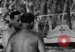Immagine di La confessione e la massa Isola di Bougainville Papua Nuova Guinea, 1944, secondo 45 filmato di repertorio 65675046499