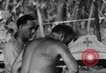 Immagine di La confessione e la massa Isola di Bougainville Papua Nuova Guinea, 1944, secondo 47 filmato di repertorio 65675046499