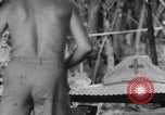 Immagine di La confessione e la massa Isola di Bougainville Papua Nuova Guinea, 1944, secondo 56 filmato di repertorio 65675046499