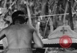 Immagine di La confessione e la massa Isola di Bougainville Papua Nuova Guinea, 1944, secondo 57 filmato di repertorio 65675046499