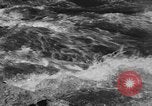 Standbild Wasser laufen Enns Österreich, 1930, aus Sekunde 60 historischem Filmmaterial Videoclip 65675046571