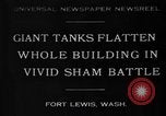 Image of tank damages old building Fort Lewis Washington USA, 1930, second 1 stock footage video 65675046578