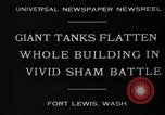 Image of tank damages old building Fort Lewis Washington USA, 1930, second 3 stock footage video 65675046578