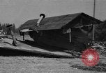 Image of tank damages old building Fort Lewis Washington USA, 1930, second 56 stock footage video 65675046578