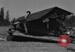 Image of tank damages old building Fort Lewis Washington USA, 1930, second 59 stock footage video 65675046578
