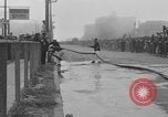 Image of firemen competition Long Beach New York USA, 1930, second 14 stock footage video 65675046585