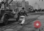 Image of firemen competition Long Beach New York USA, 1930, second 15 stock footage video 65675046585