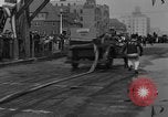 Image of firemen competition Long Beach New York USA, 1930, second 16 stock footage video 65675046585