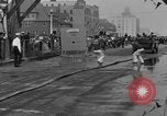 Image of firemen competition Long Beach New York USA, 1930, second 18 stock footage video 65675046585