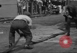 Image of firemen competition Long Beach New York USA, 1930, second 28 stock footage video 65675046585