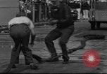 Image of firemen competition Long Beach New York USA, 1930, second 29 stock footage video 65675046585