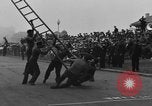 Image of firemen competition Long Beach New York USA, 1930, second 57 stock footage video 65675046585
