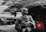 Immagine di Danni dovuti a sgranare Il Vietnam, 1962, secondo 14 filmato di repertorio 65675046658