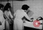 Image of wounded patients Vietnam, 1962, second 6 stock footage video 65675046660
