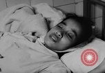 Image of wounded patients Vietnam, 1962, second 17 stock footage video 65675046660