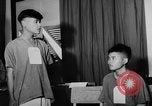 Image of wounded patients Vietnam, 1962, second 27 stock footage video 65675046660