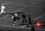 Standbild berühmten Fußball-Highlights von 1940 United States USA, 1940, aus Sekunde 13 historischem Filmmaterial Videoclip 65675046739
