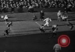 Standbild berühmten Fußball-Highlights von 1940 United States USA, 1940, aus Sekunde 26 historischem Filmmaterial Videoclip 65675046739
