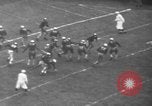 Standbild berühmten Fußball-Highlights von 1940 United States USA, 1940, aus Sekunde 48 historischem Filmmaterial Videoclip 65675046739