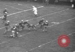 Standbild berühmten Fußball-Highlights von 1940 United States USA, 1940, aus Sekunde 49 historischem Filmmaterial Videoclip 65675046739