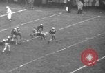 Standbild berühmten Fußball-Highlights von 1940 United States USA, 1940, aus Sekunde 50 historischem Filmmaterial Videoclip 65675046739