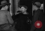 Image of men drink coke Portsmouth New Hampshire USA, 1942, second 24 stock footage video 65675046813