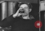 Image of men drink coke Portsmouth New Hampshire USA, 1942, second 62 stock footage video 65675046813