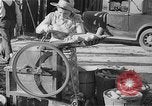 Image of corn sheller United States USA, 1945, second 26 stock footage video 65675046824