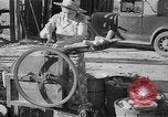 Image of corn sheller United States USA, 1945, second 27 stock footage video 65675046824
