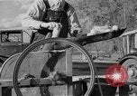 Image of corn sheller United States USA, 1945, second 55 stock footage video 65675046824