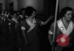 Standbild lange Schlange von uniformierten Zimmermädchen erhalten ihre Reinigungsgeräte United States USA, 1945, aus Sekunde 18 historischem Filmmaterial Videoclip 65675046827