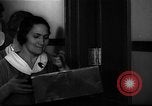 Standbild lange Schlange von uniformierten Zimmermädchen erhalten ihre Reinigungsgeräte United States USA, 1945, aus Sekunde 45 historischem Filmmaterial Videoclip 65675046827