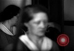 Standbild lange Schlange von uniformierten Zimmermädchen erhalten ihre Reinigungsgeräte United States USA, 1945, aus Sekunde 53 historischem Filmmaterial Videoclip 65675046827